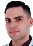 Врач Харламов Виктор Евгеньевич